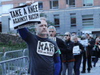 ‘Take a Knee’ and ‘Black Lives Matter’ Protesters Block Light Rail Carrying Spectators to Super Bowl